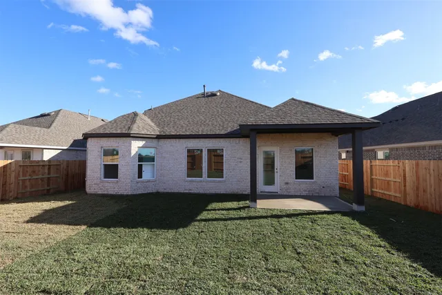 a room with a sink and a mirror
