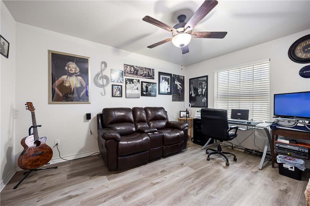 9227 Baker Road Sinton, TX 78387 - Photo 25 of 28 a living room with furniture and a window