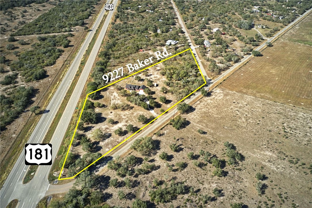 9227 Baker Road Sinton, TX 78387 - Photo 6 of 28 a city view with tall trees