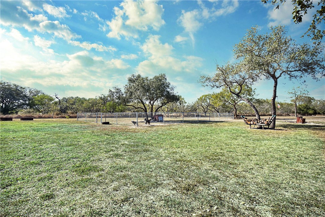 9227 Baker Road Sinton, TX 78387 - Photo 6 of 23 a view of outdoor space with deck and yard