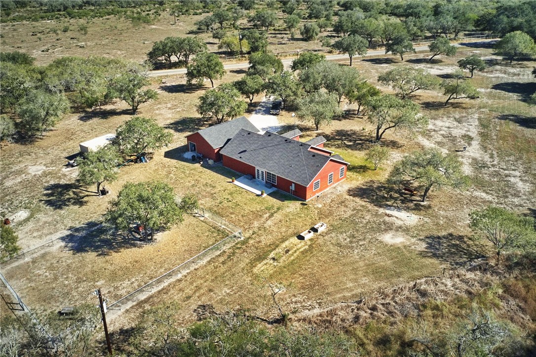 9227 Baker Road Sinton, TX 78387 - Photo 8 of 28 an aerial view of residential houses with outdoor space