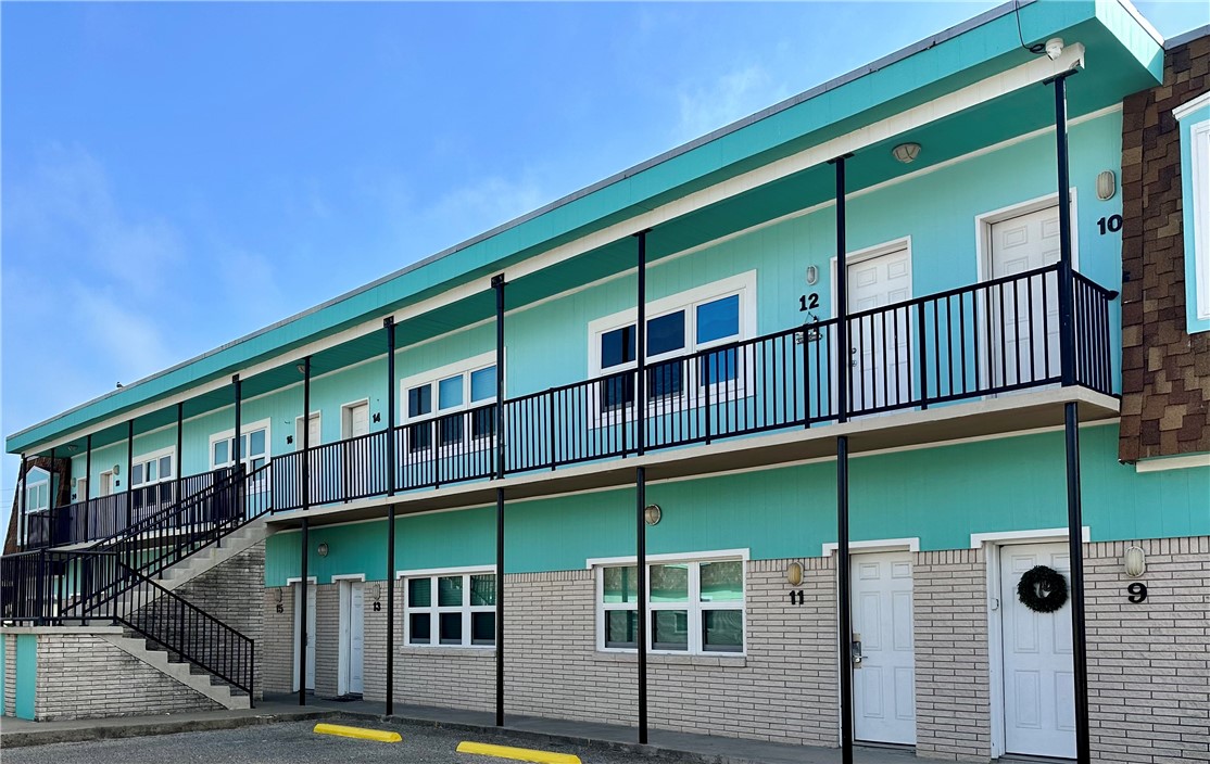 700 Island Retreat Road, Unit 14 Port Aransas, TX 78373 - Photo 1 of 23 a balcony with furniture