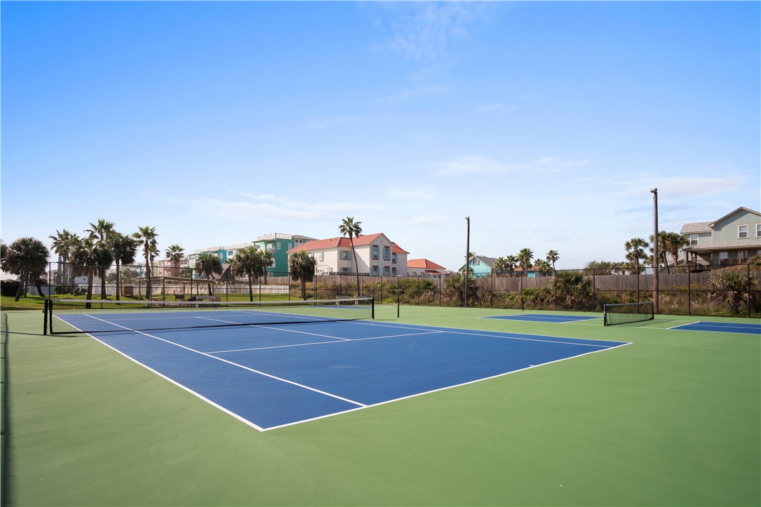 700 Island Retreat Road, Unit 14 Port Aransas, TX 78373 - Photo 7 of 23 a view of an outdoor space and tennis court
