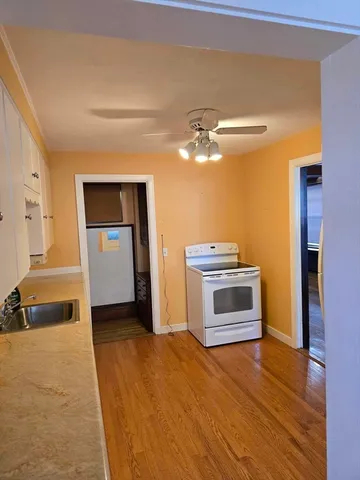 a bedroom with a bed and a view of bathroom