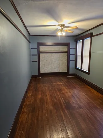 a view of an empty room and window