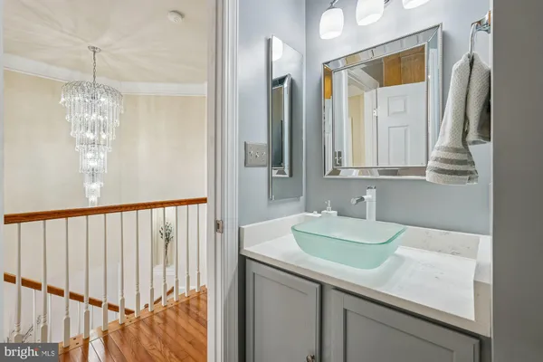 a bathroom with a sink and toilet
