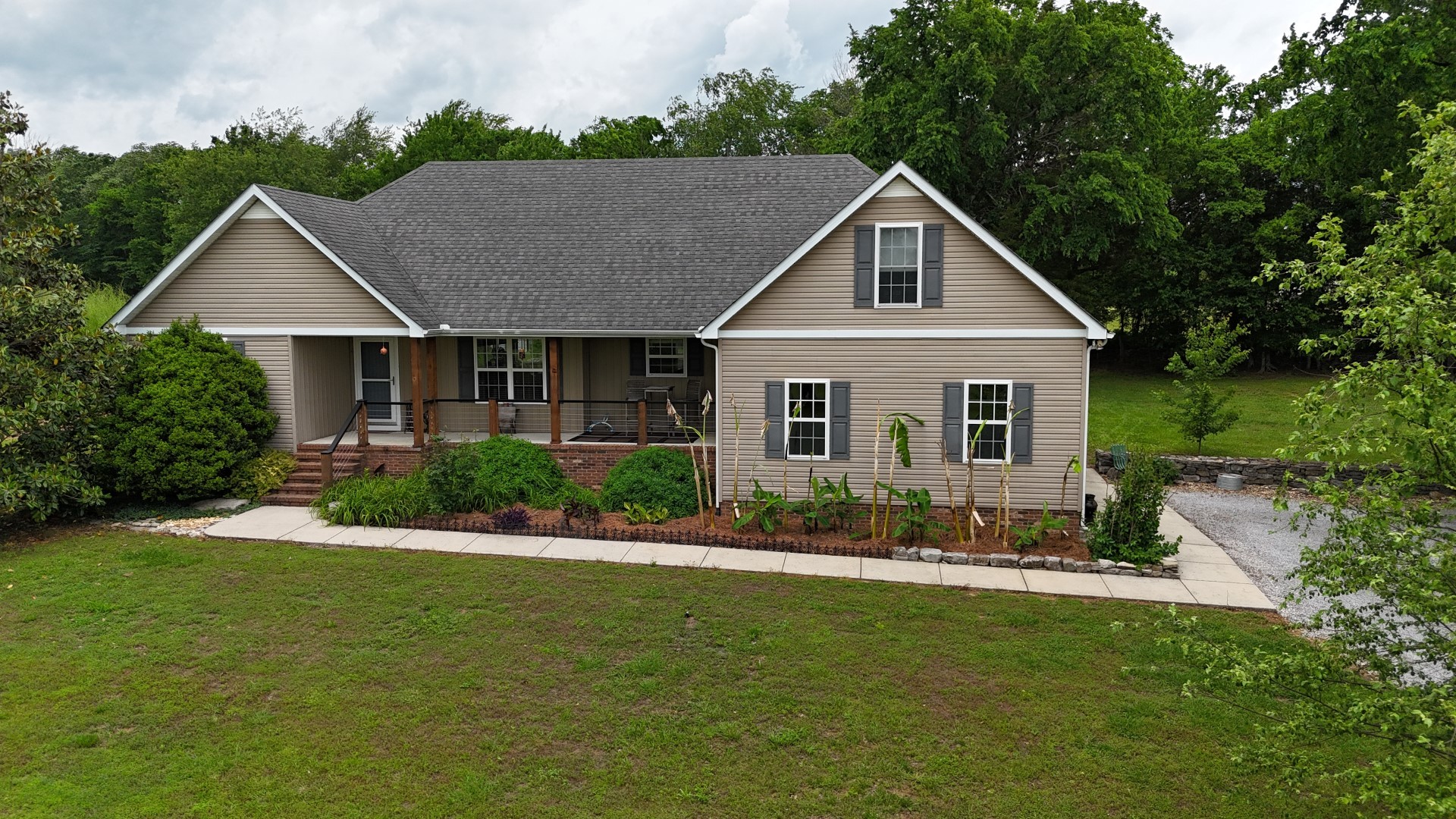 1157 Knox Road Readyville, TN 37149 - Photo 9 of 100 a front view of a house with a yard