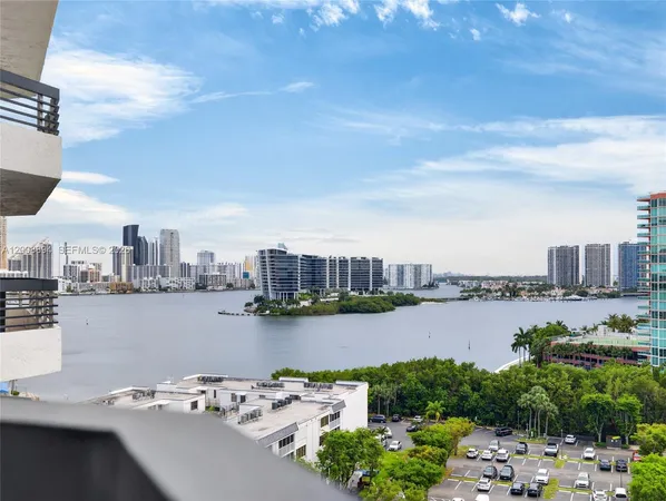 a view of a city and lake
