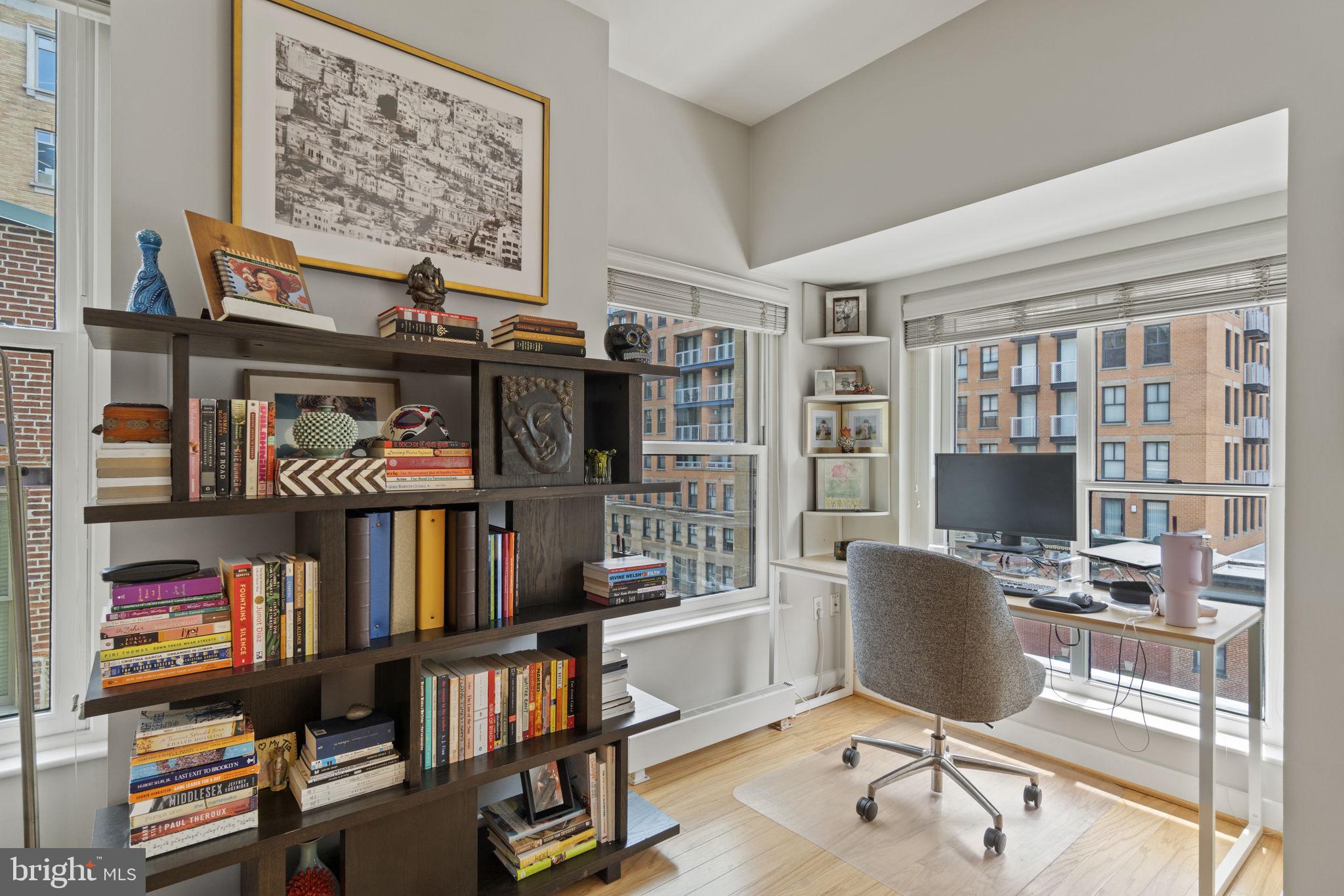 675 E Street Northwest, Unit 500 Washington, DC 20004 - Photo 8 of 52 a view of a workspace with furniture