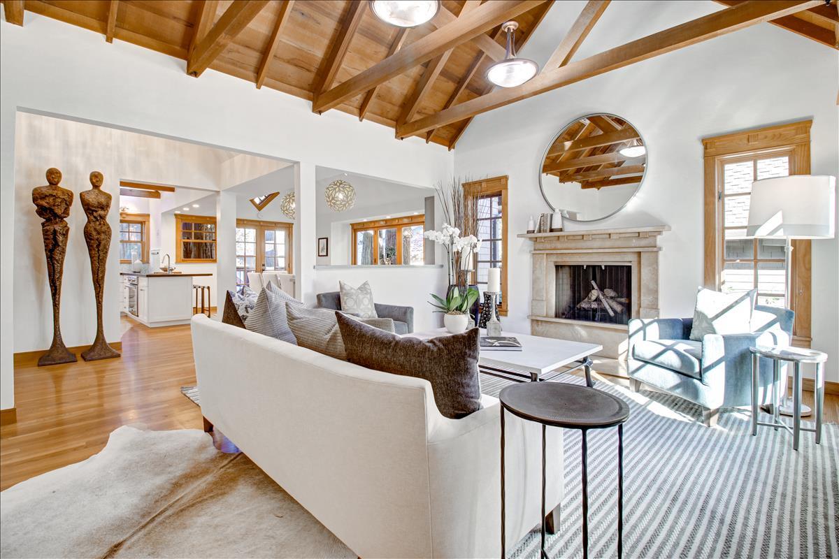 836 Creek Drive Menlo Park, CA 94025 - Photo 2 of 39 a living room with furniture a fireplace and a flat screen tv
