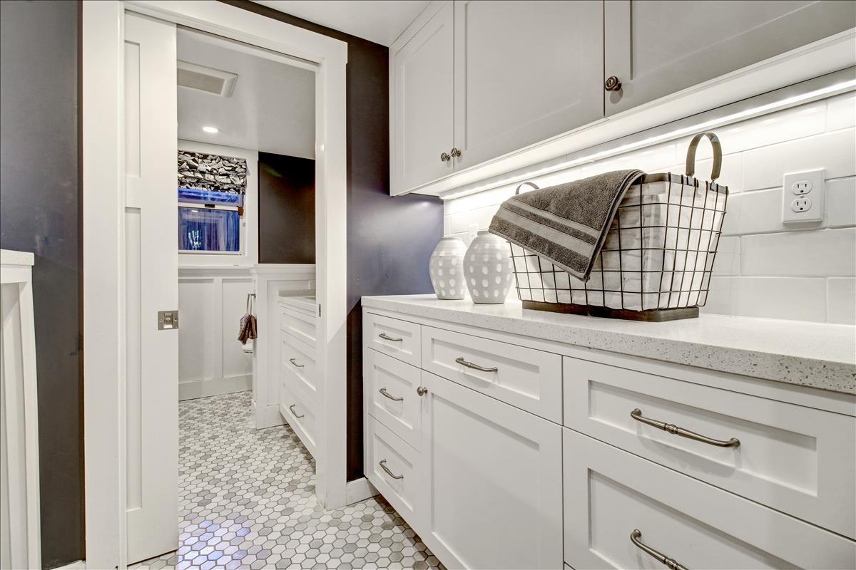836 Creek Drive Menlo Park, CA 94025 - Photo 11 of 39 a kitchen with white cabinets and sink