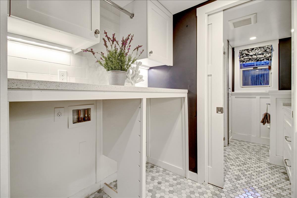836 Creek Drive Menlo Park, CA 94025 - Photo 12 of 39 a view of bathroom with a sink a mirror and a shower