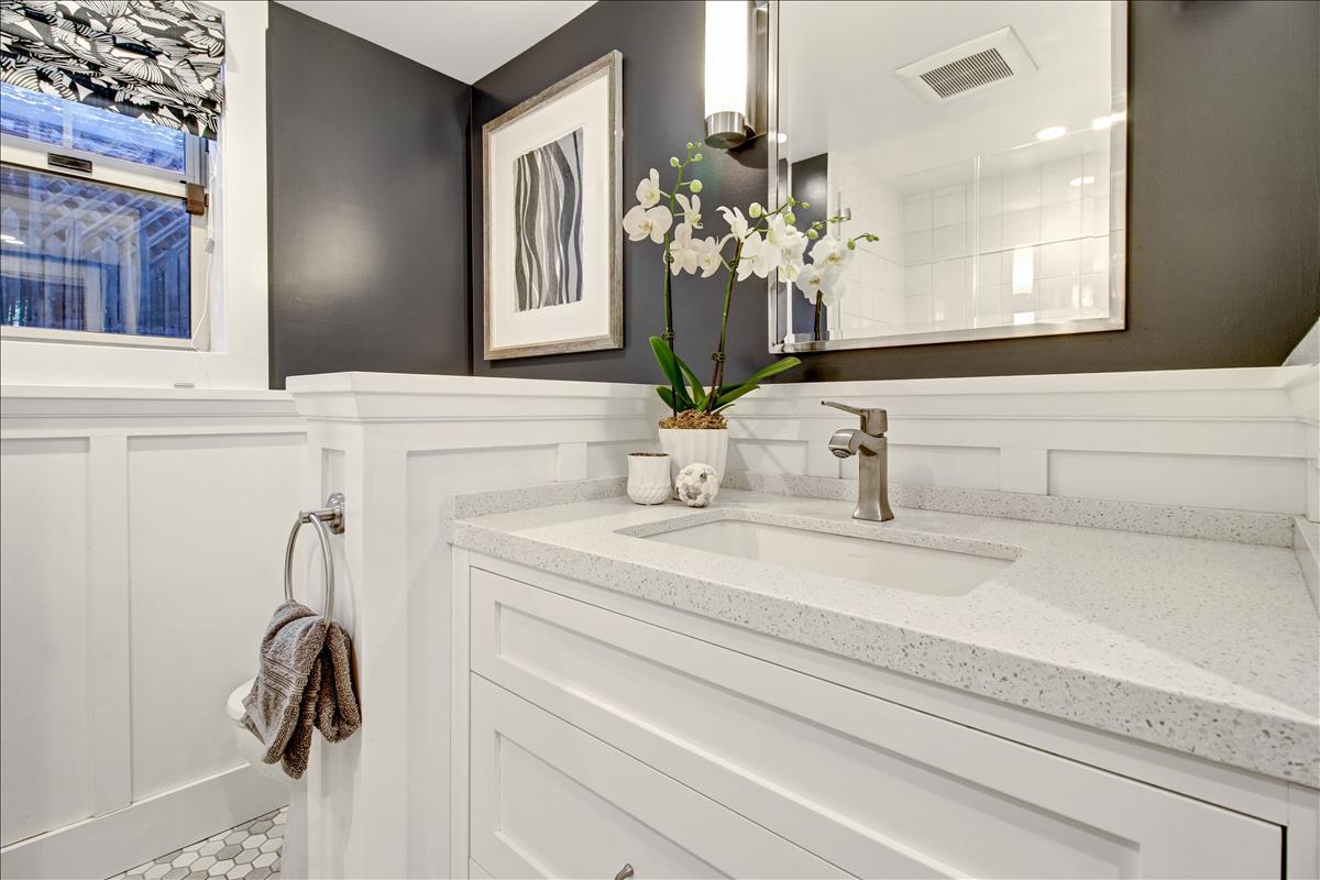 836 Creek Drive Menlo Park, CA 94025 - Photo 14 of 39 a bathroom with a sink and a mirror