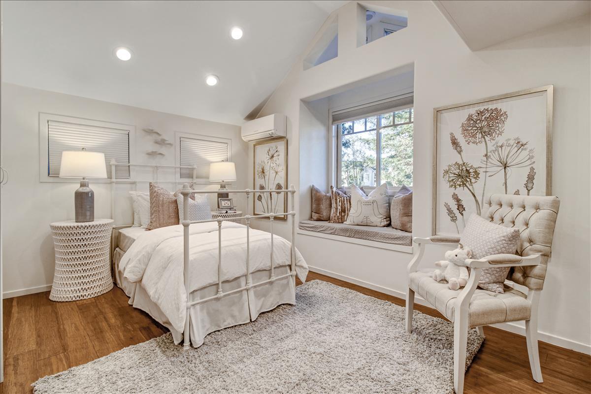 836 Creek Drive Menlo Park, CA 94025 - Photo 18 of 39 a spacious bedroom with a bed and a couch