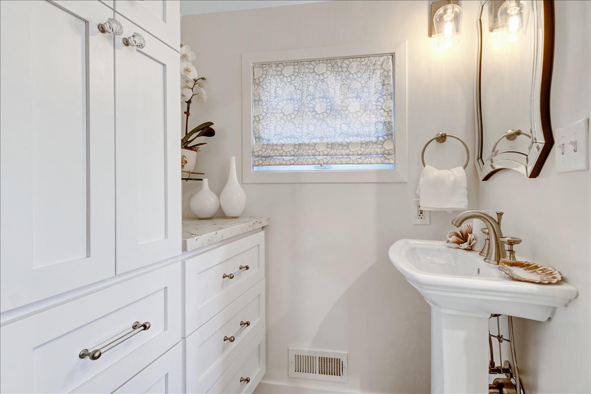 836 Creek Drive Menlo Park, CA 94025 - Photo 19 of 39 a bathroom with a sink and mirror