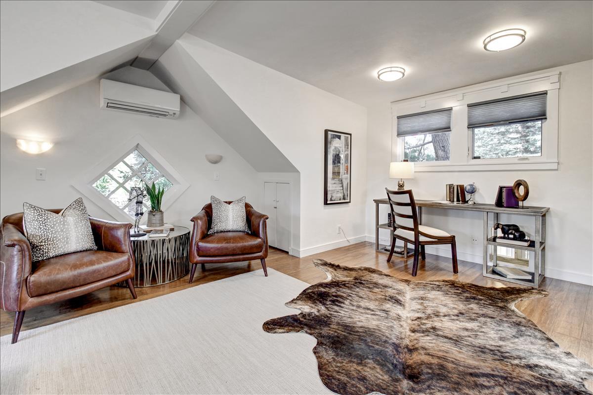 836 Creek Drive Menlo Park, CA 94025 - Photo 27 of 39 a living room with furniture and a wooden floor