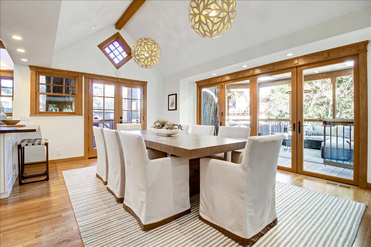 836 Creek Drive Menlo Park, CA 94025 - Photo 4 of 39 a view of a dining room with furniture a chandelier and wooden floor