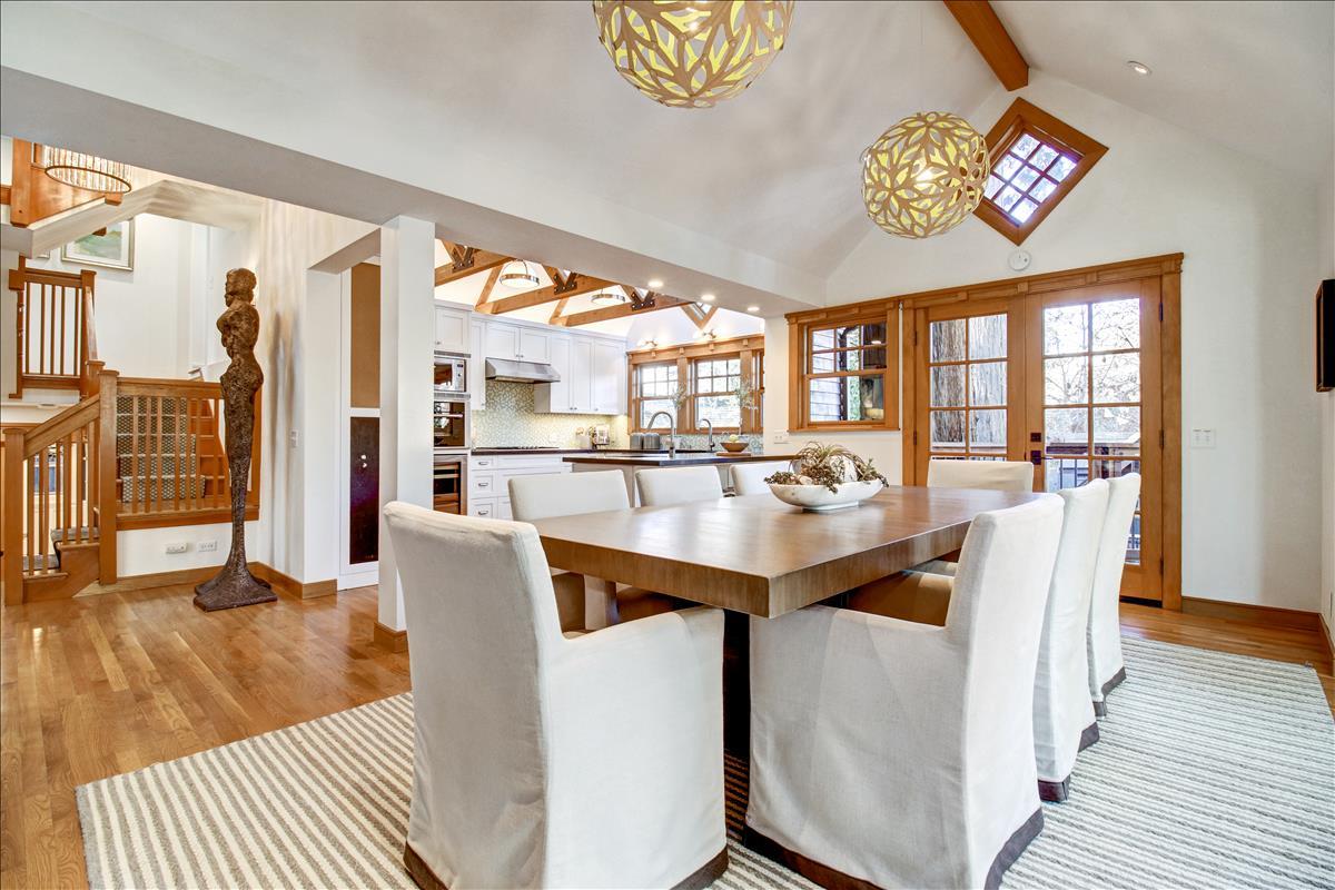 836 Creek Drive Menlo Park, CA 94025 - Photo 5 of 39 a view of a dining room with furniture a chandelier and wooden floor