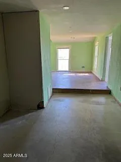 a view of empty room with front door