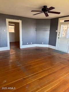 203 3rd Street Jerome, AZ 86331 - Photo 8 of 18 a view of a livingroom with wooden floor and a ceiling fan