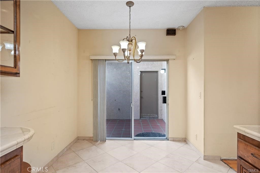 25626 1/2 Oak Street Lomita, CA 90717 - Photo 11 of 39 a view of a chandelier in a room