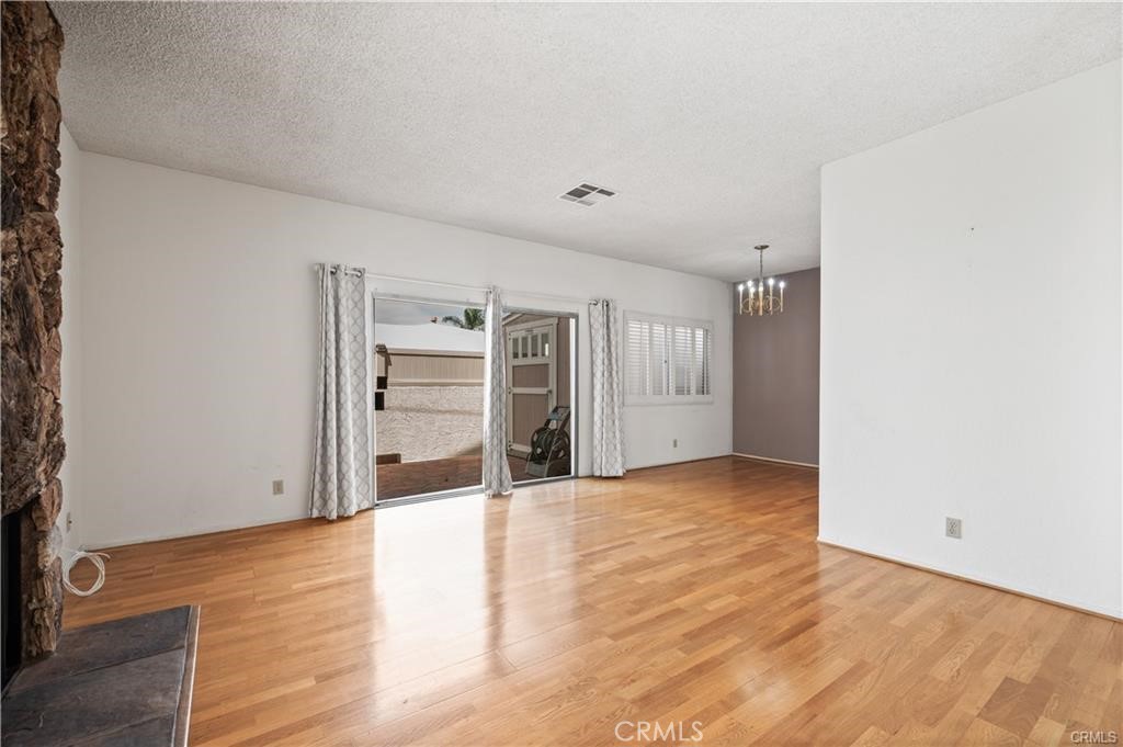 25626 1/2 Oak Street Lomita, CA 90717 - Photo 16 of 39 a view of an empty room with wooden floor