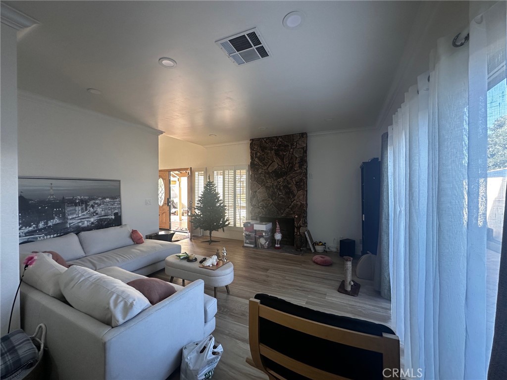25626 1/2 Oak Street Lomita, CA 90717 - Photo 19 of 39 a living room with furniture and a window