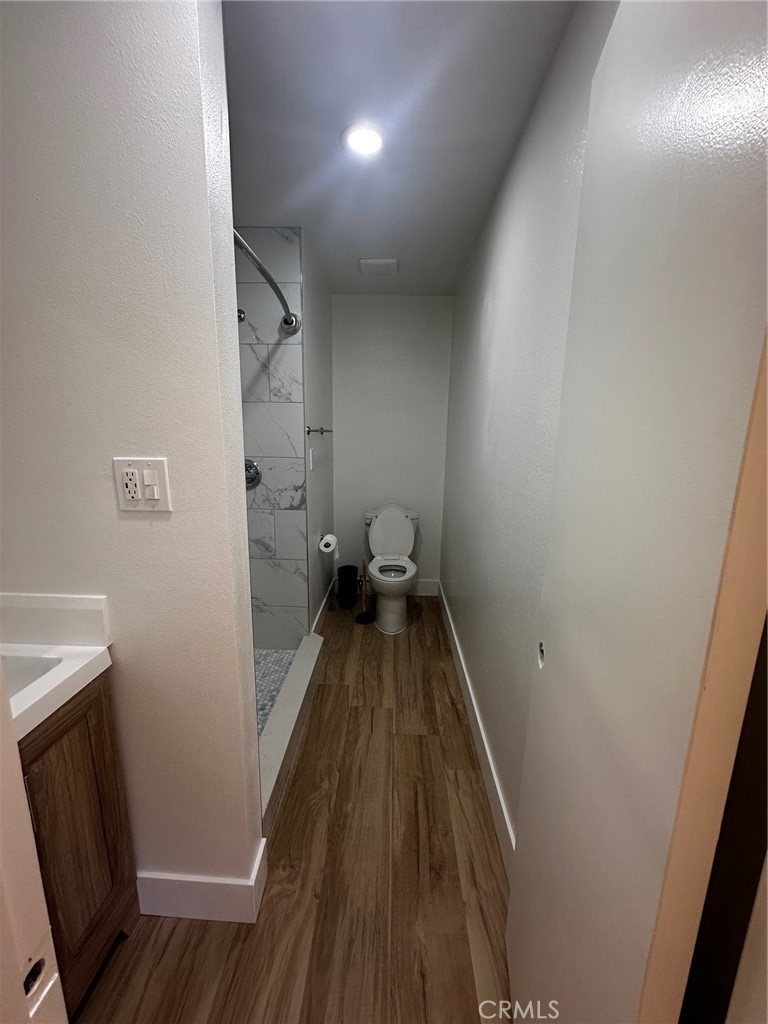 25626 1/2 Oak Street Lomita, CA 90717 - Photo 23 of 39 a view of a closet with wooden floor
