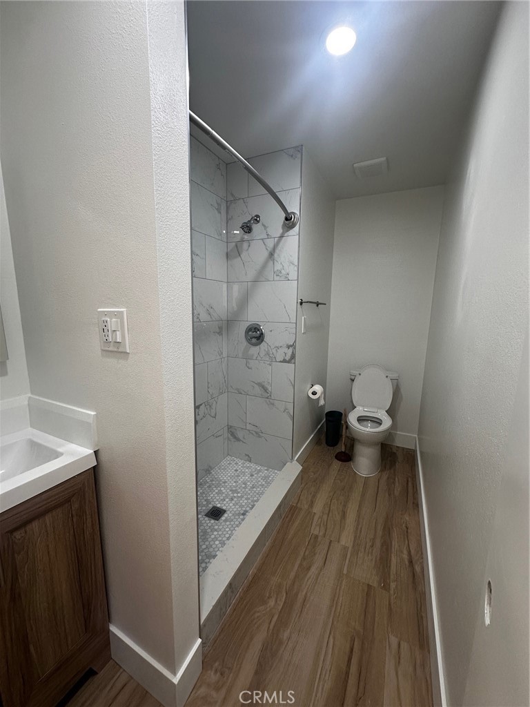 25626 1/2 Oak Street Lomita, CA 90717 - Photo 26 of 39 a bathroom with a sink and a toilet