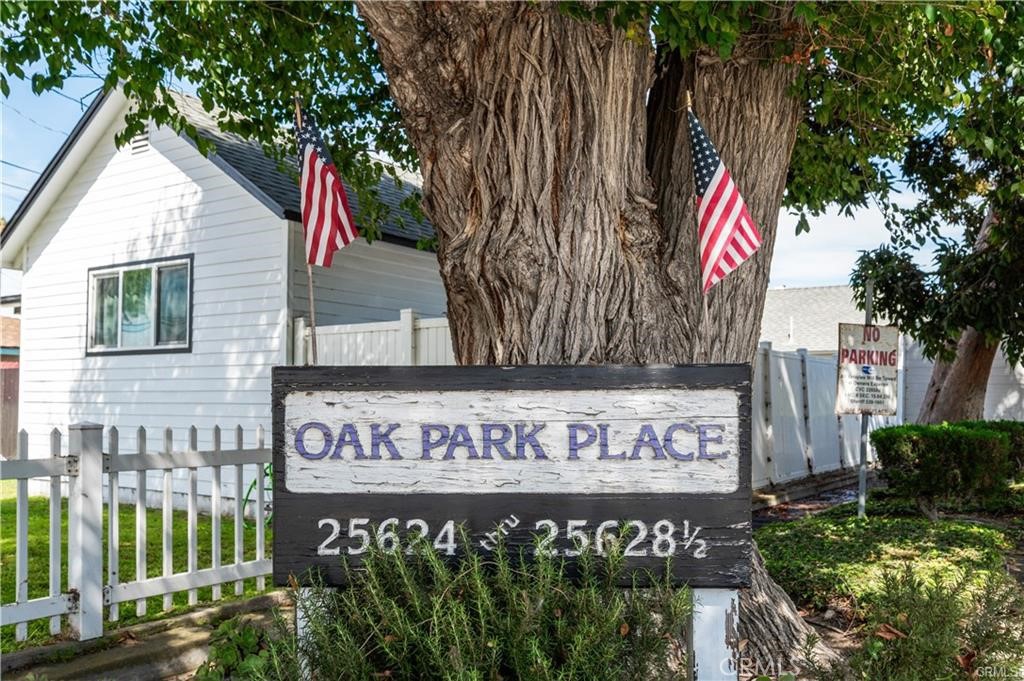 25626 1/2 Oak Street Lomita, CA 90717 - Photo 39 of 39 a view of a sign under a tree