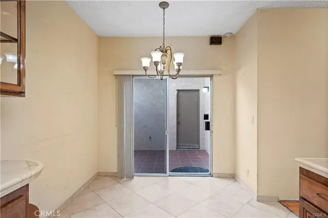 a view of a chandelier in a room
