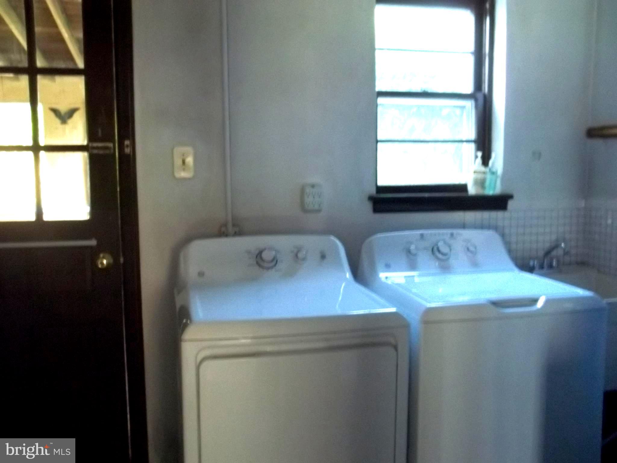 5 Broadale Road Doylestown, PA 18901 - Photo 12 of 27 a utility room with dryer and washer
