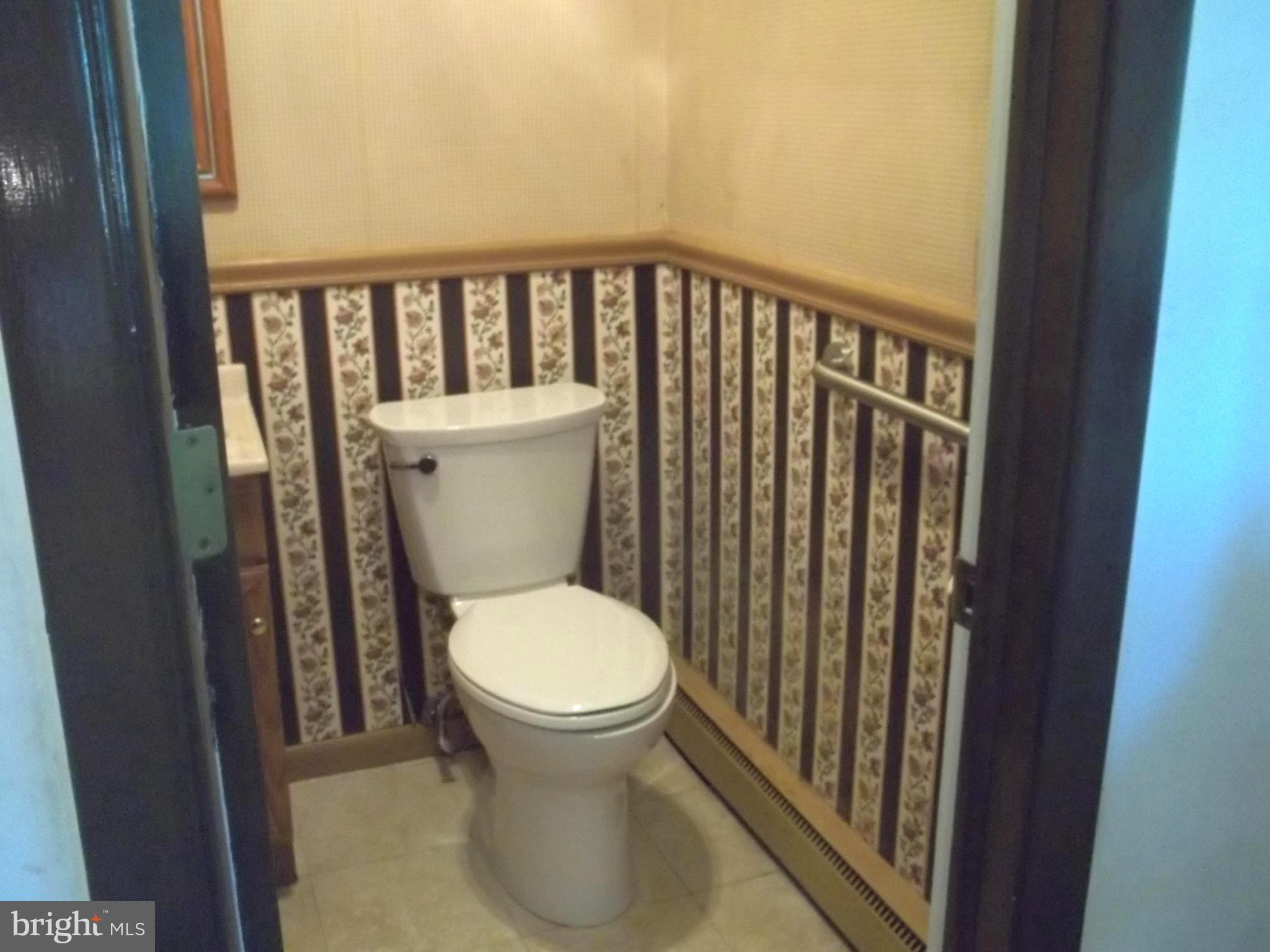 5 Broadale Road Doylestown, PA 18901 - Photo 13 of 27 a bathroom with a toilet and a sink