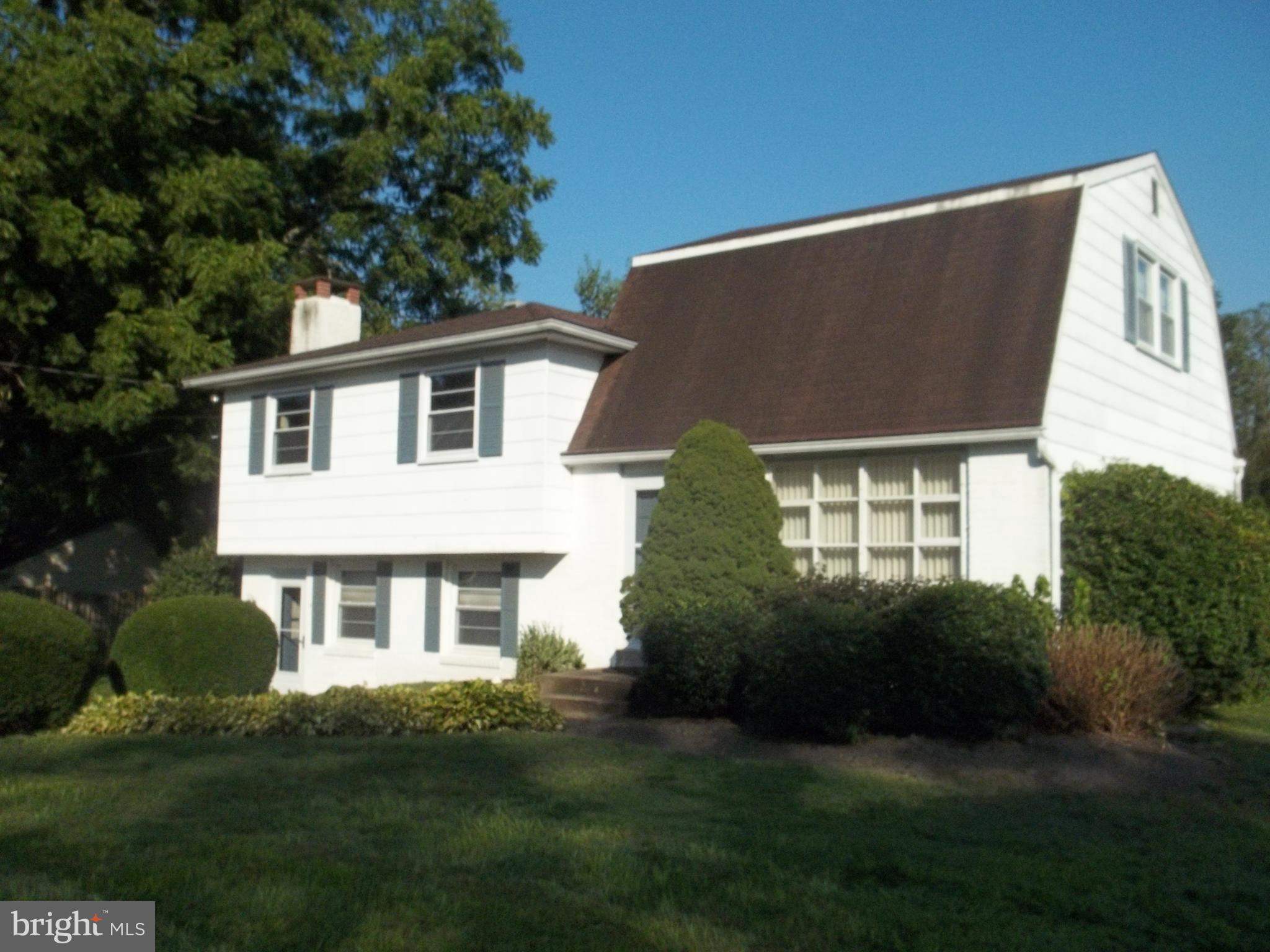 5 Broadale Road Doylestown, PA 18901 - Photo 3 of 27 a front view of a house with a garden