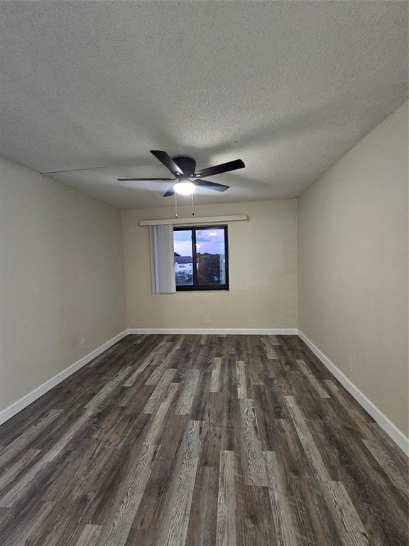 3720 North Pine Island Road, Unit 428 Sunrise, FL 33351 - Photo 12 of 22 a view of empty room with window and ceiling fan