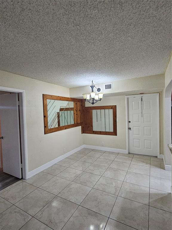 3720 North Pine Island Road, Unit 428 Sunrise, FL 33351 - Photo 19 of 22 a view of a livingroom with furniture and chandelier