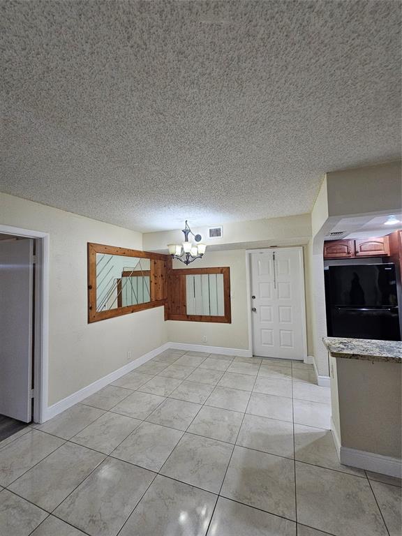 3720 North Pine Island Road, Unit 428 Sunrise, FL 33351 - Photo 20 of 22 a view of a kitchen with microwave and cabinets