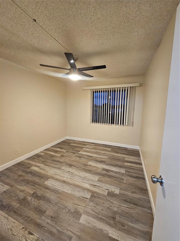 3720 North Pine Island Road, Unit 428 Sunrise, FL 33351 - Photo 2 of 22 a view of a livingroom with a staircase