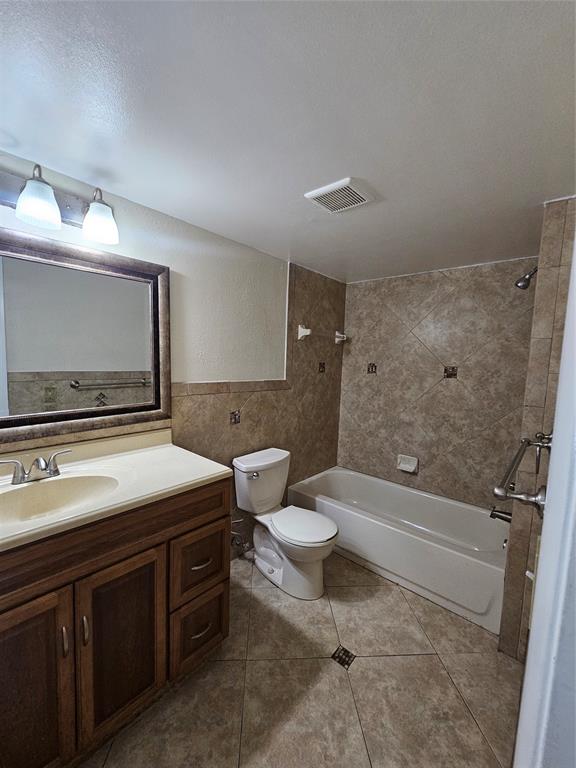 3720 North Pine Island Road, Unit 428 Sunrise, FL 33351 - Photo 3 of 22 a bathroom with a toilet a sink and bathtub