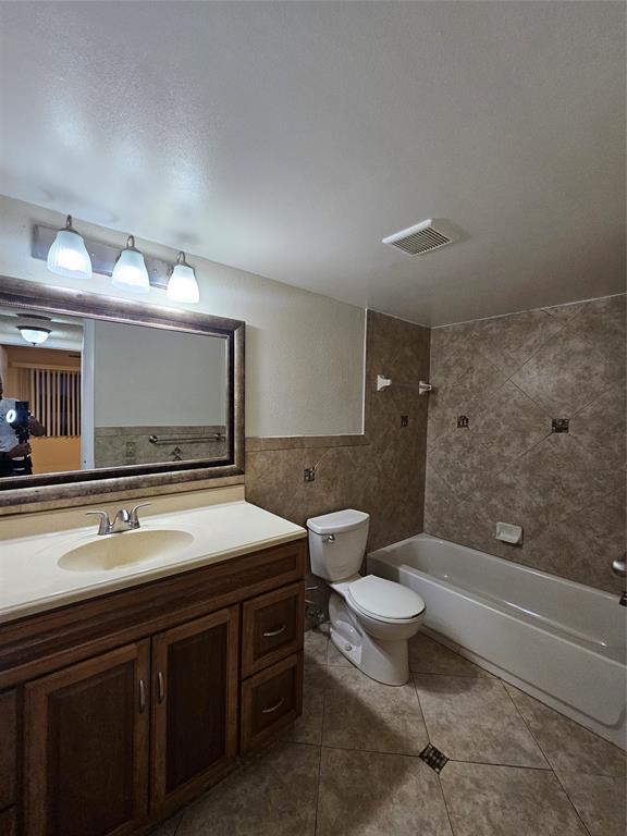 3720 North Pine Island Road, Unit 428 Sunrise, FL 33351 - Photo 5 of 22 a bathroom with a sink a toilet a mirror and shower