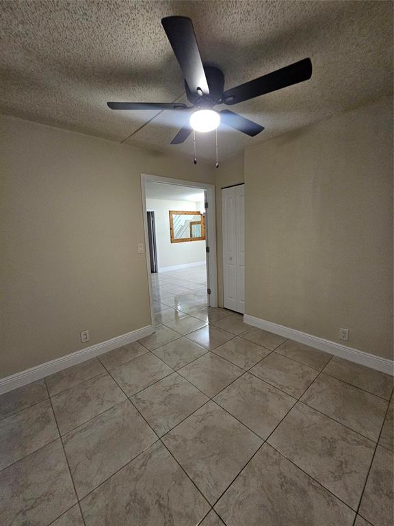 3720 North Pine Island Road, Unit 428 Sunrise, FL 33351 - Photo 6 of 22 a view of an empty room