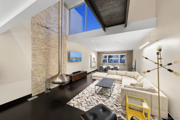 a living room with furniture and a table