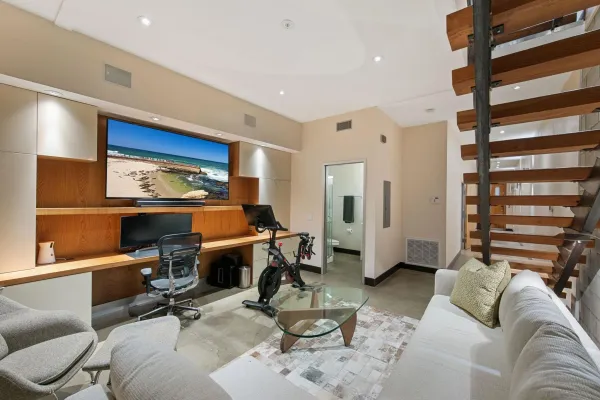 a kitchen with stainless steel appliances stove microwave and cabinets
