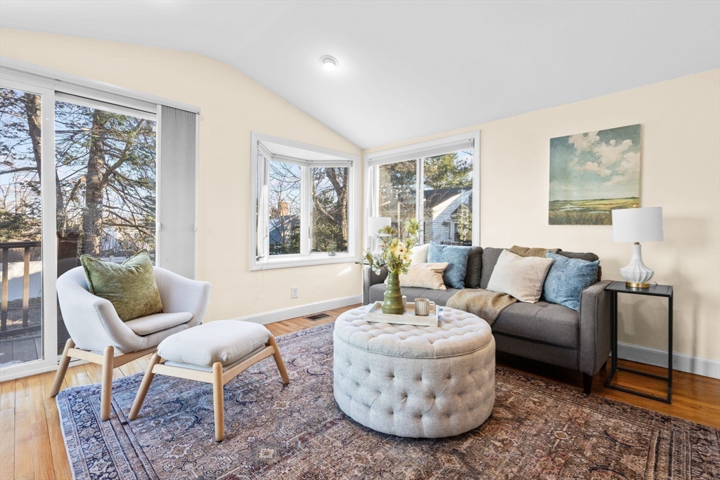 512 Appleton Street Arlington, MA 02476 - Photo 16 of 42 a living room with furniture and a large window