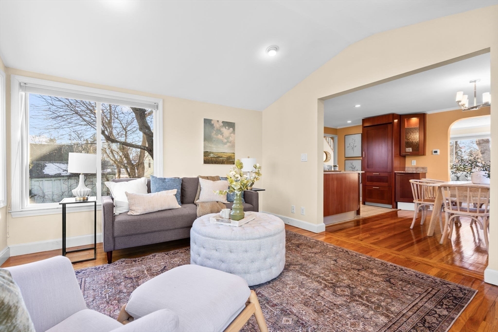 512 Appleton Street Arlington, MA 02476 - Photo 17 of 42 a living room with furniture and a large window