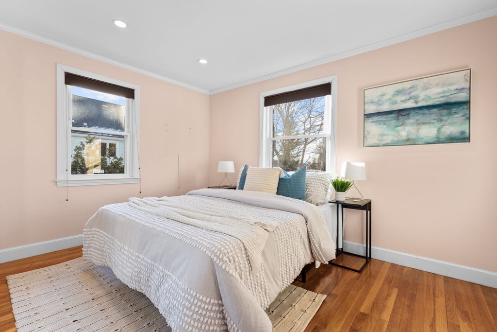 512 Appleton Street Arlington, MA 02476 - Photo 21 of 42 a bedroom with a bed and a window