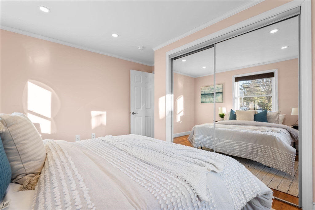 512 Appleton Street Arlington, MA 02476 - Photo 22 of 42 a bedroom with two beds and a large window