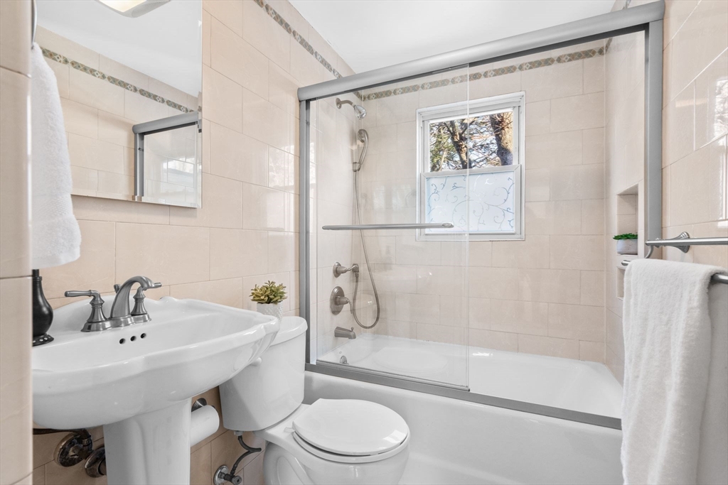 512 Appleton Street Arlington, MA 02476 - Photo 24 of 42 a bathroom with a sink toilet and shower