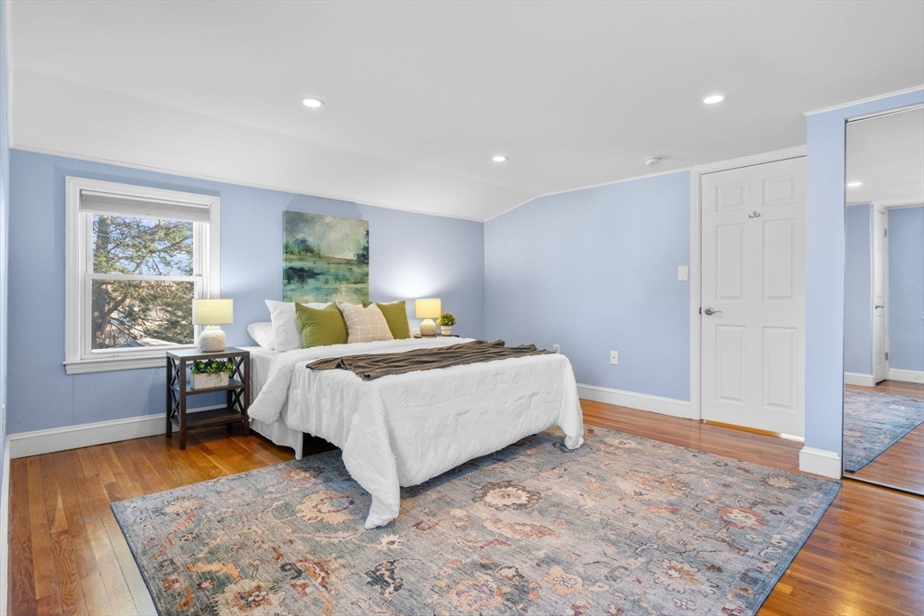 512 Appleton Street Arlington, MA 02476 - Photo 27 of 42 a bedroom with a bed and window