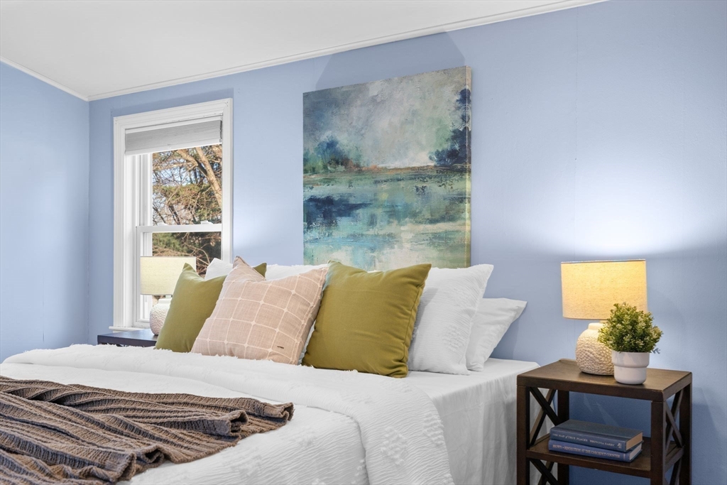 512 Appleton Street Arlington, MA 02476 - Photo 28 of 42 a bedroom with a bed and a window